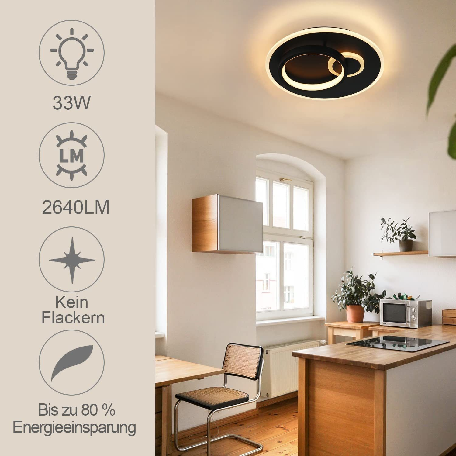 Eine Deckenlampe in einer Küche. Die Lampe hat zwei Ringe und ein Schwarz-Weiß-Farbschema.