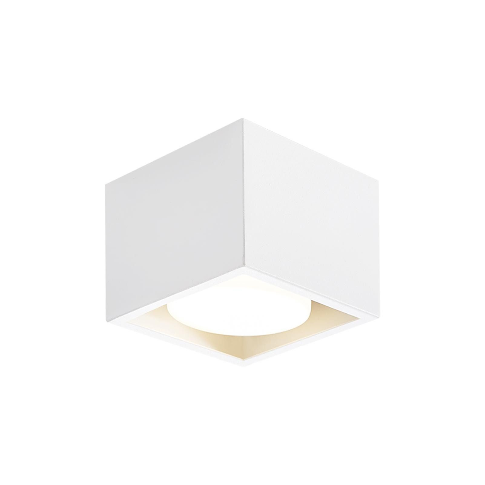 Plafoniera quadrata bianca con sorgente luminosa circolare incassata.