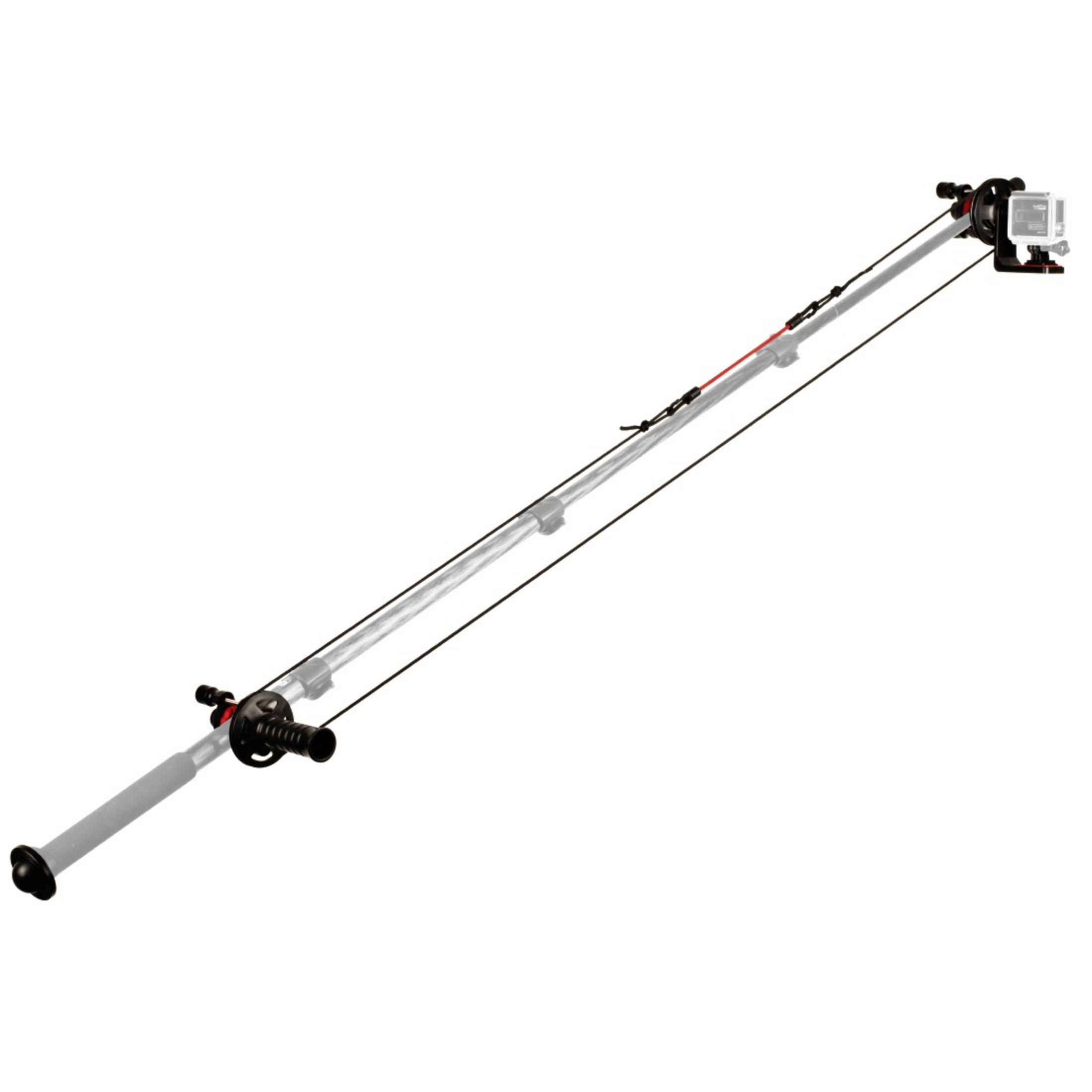 Długie, szare urządzenie z czarnymi pokrętłami i przymocowaną kamerą, rozciągające się po przekątnej na białym tle.