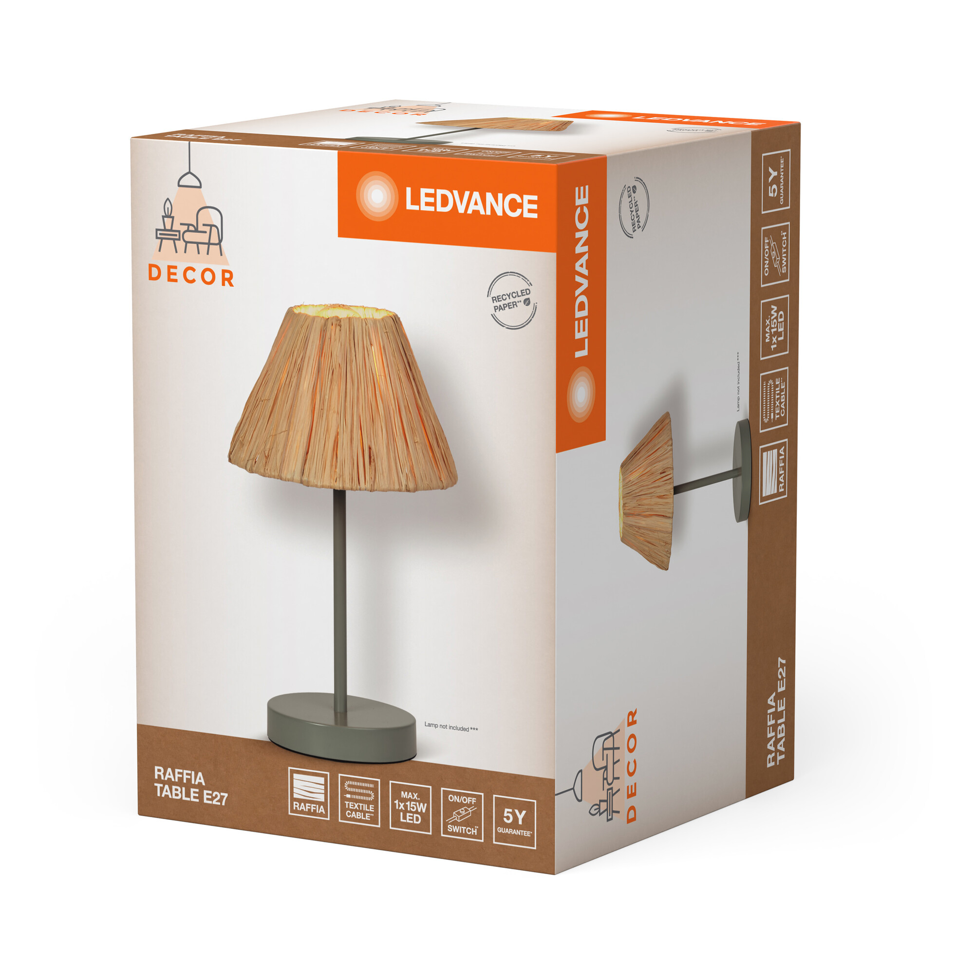 Eine Box mit einer Lampe darin. Die Lampe hat einen braunen Schirm und grauen Fuß.