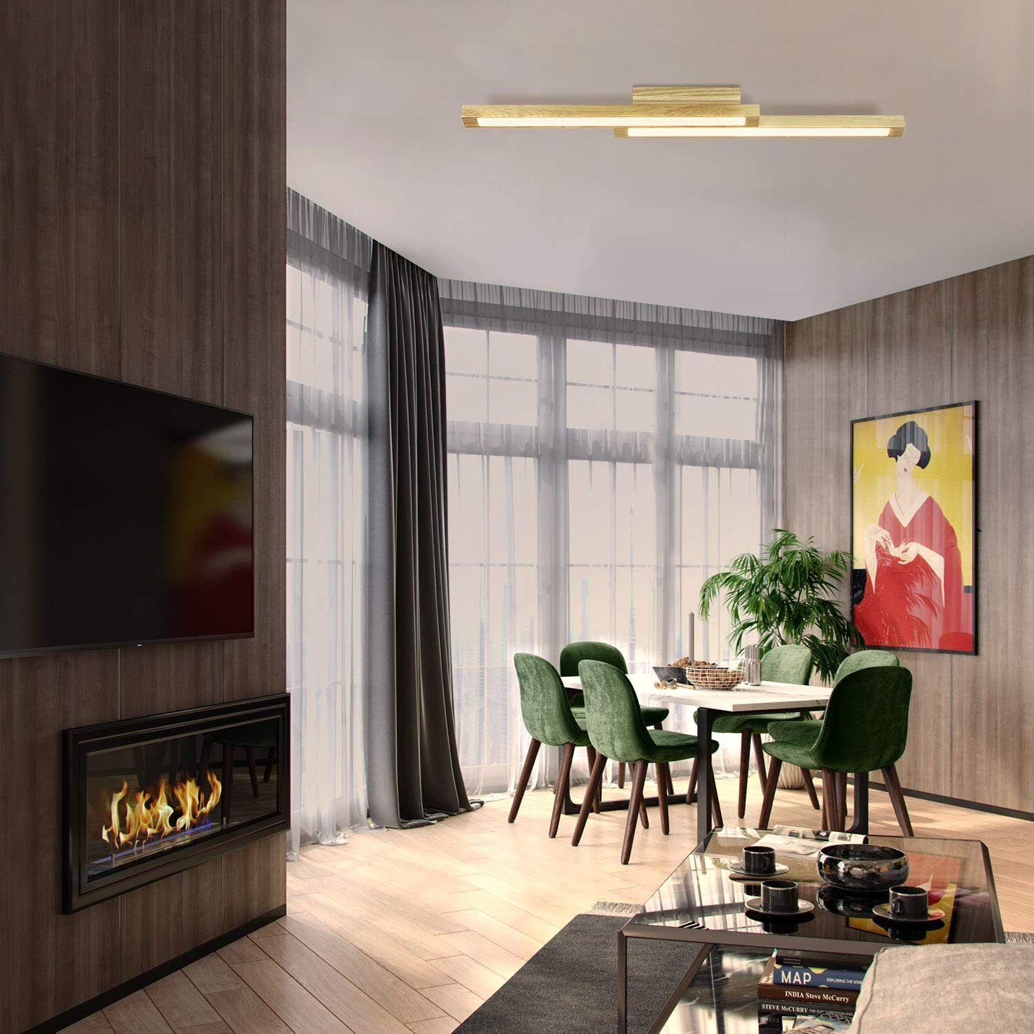 Ein Esszimmer mit Tisch, Stühlen, Kunstwerk, Kamin und Deckenleuchte.