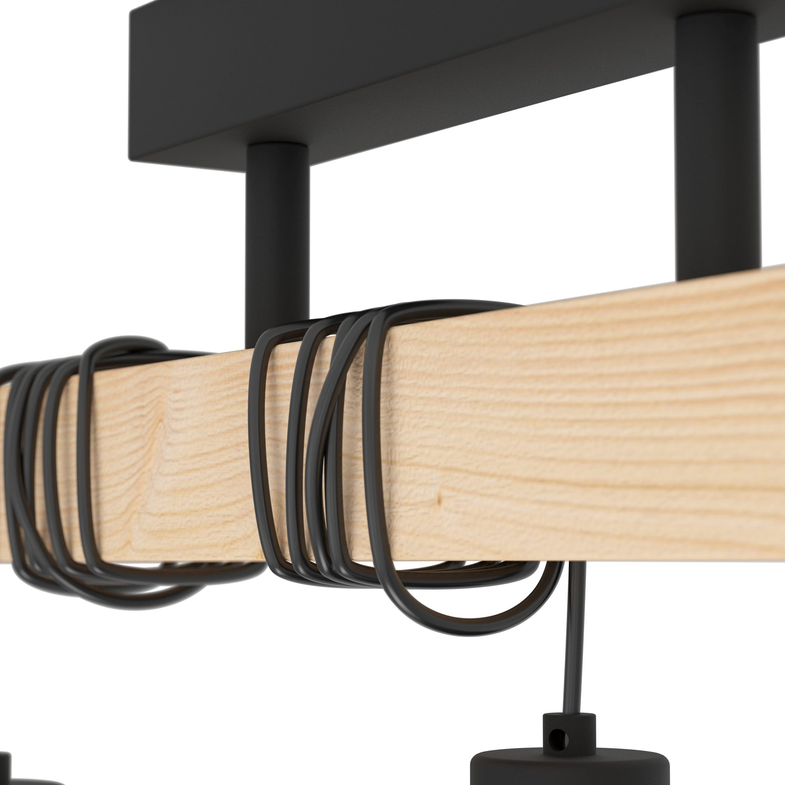 Primo piano di una trave di legno con fili neri avvolti attorno e luci nere appese.
