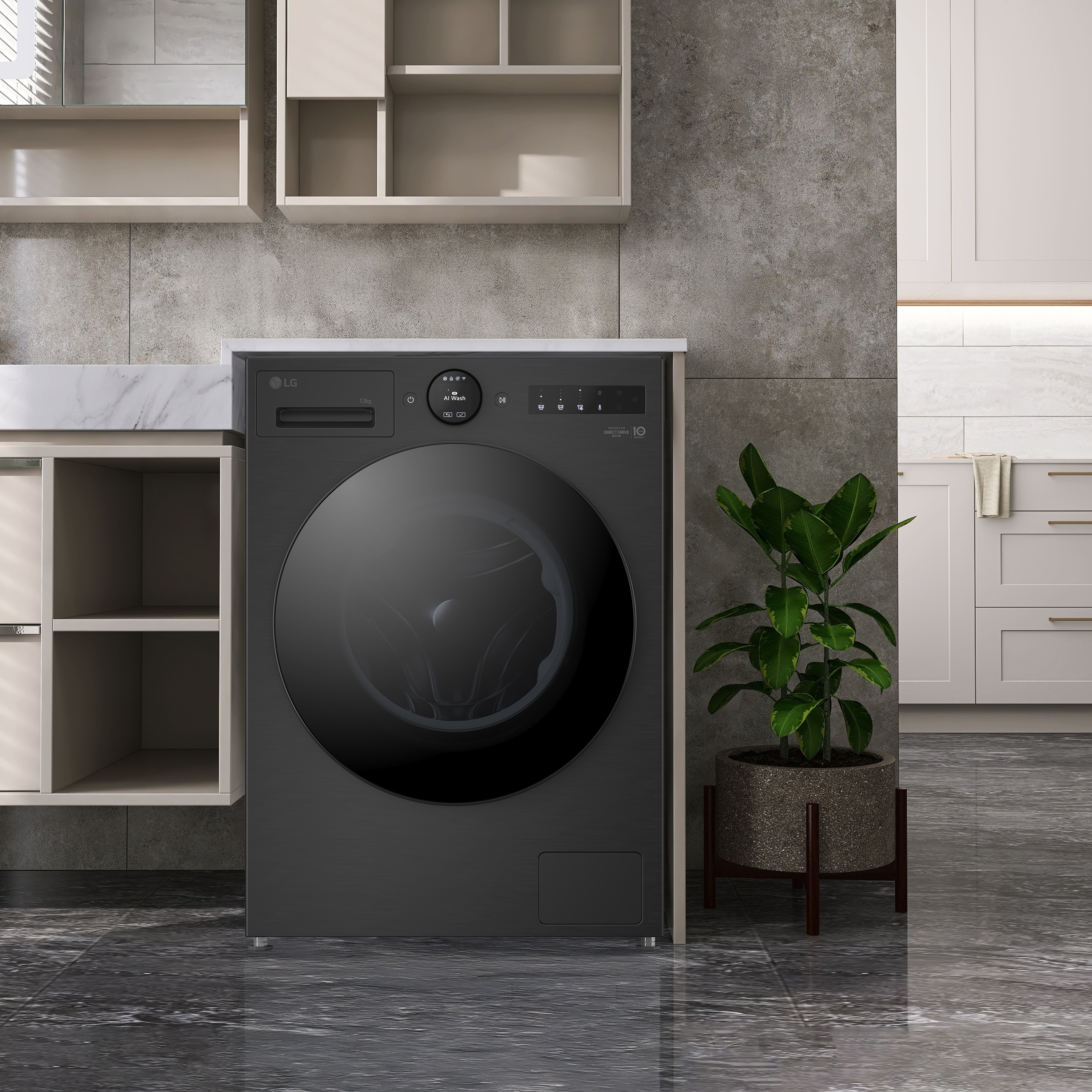Un lave-linge noir est placé dans un cadre de cuisine.
