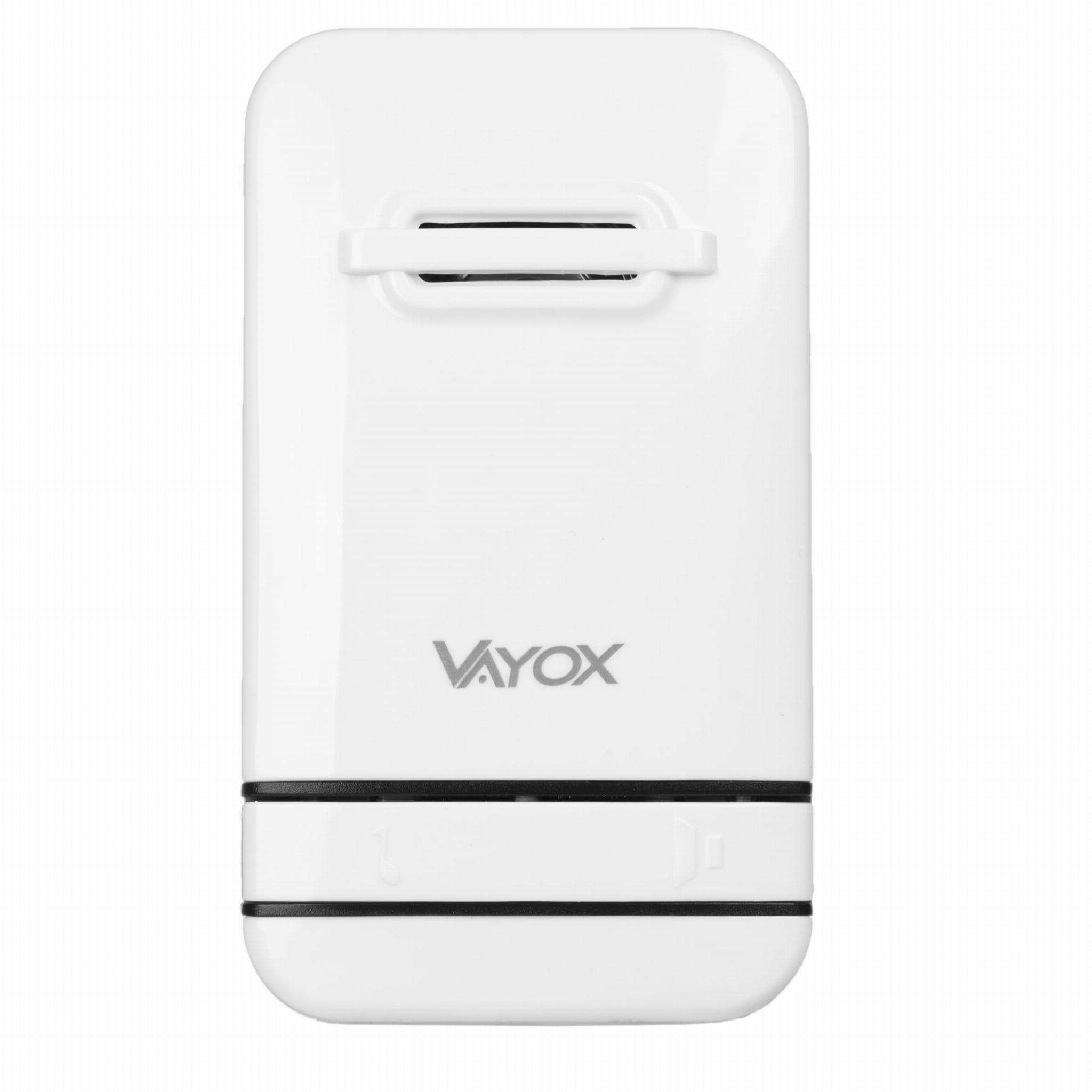 Białe urządzenie Vayox z uchwytem i logo, czarne paski. Ma prostokątny kształt.