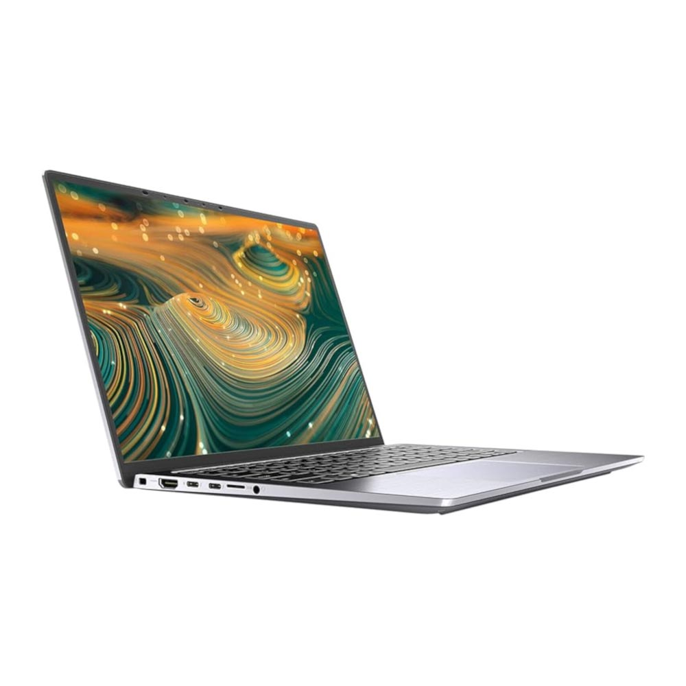 Srebrny laptop jest otwarty, wyświetlając abstrakcyjne, kolorowe tło. Stoi na białej powierzchni.