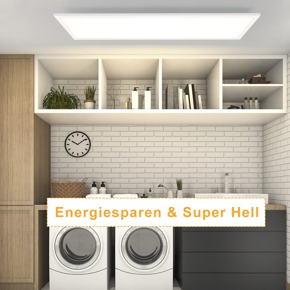 Pralnia z białą lampą sufitową i dwiema pralkami. Tekst mówi 'Oszczędność energii i super jasne'.