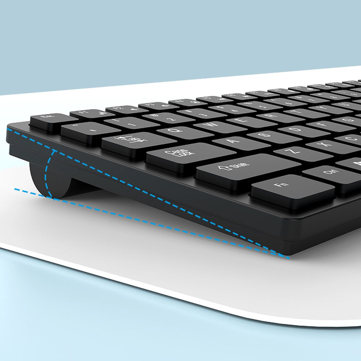 Czarna klawiatura, widok z boku, z klawiszami Fn, na białej powierzchni.