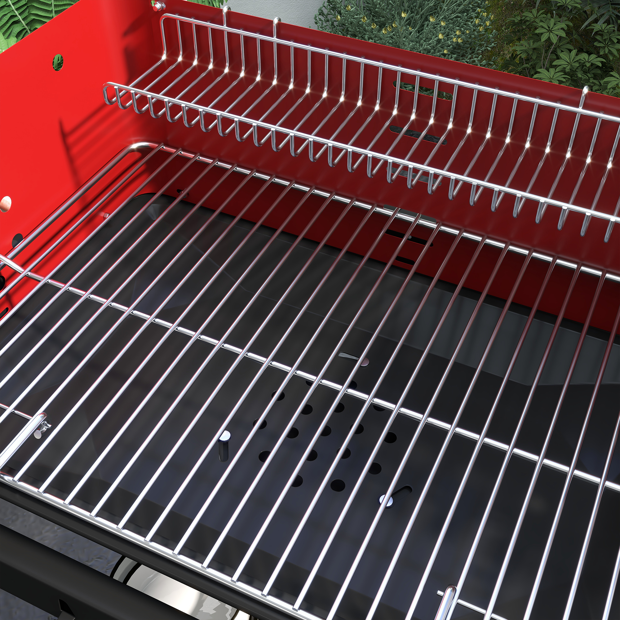 Roter Grill mit Metallrosten, Nahaufnahme.
