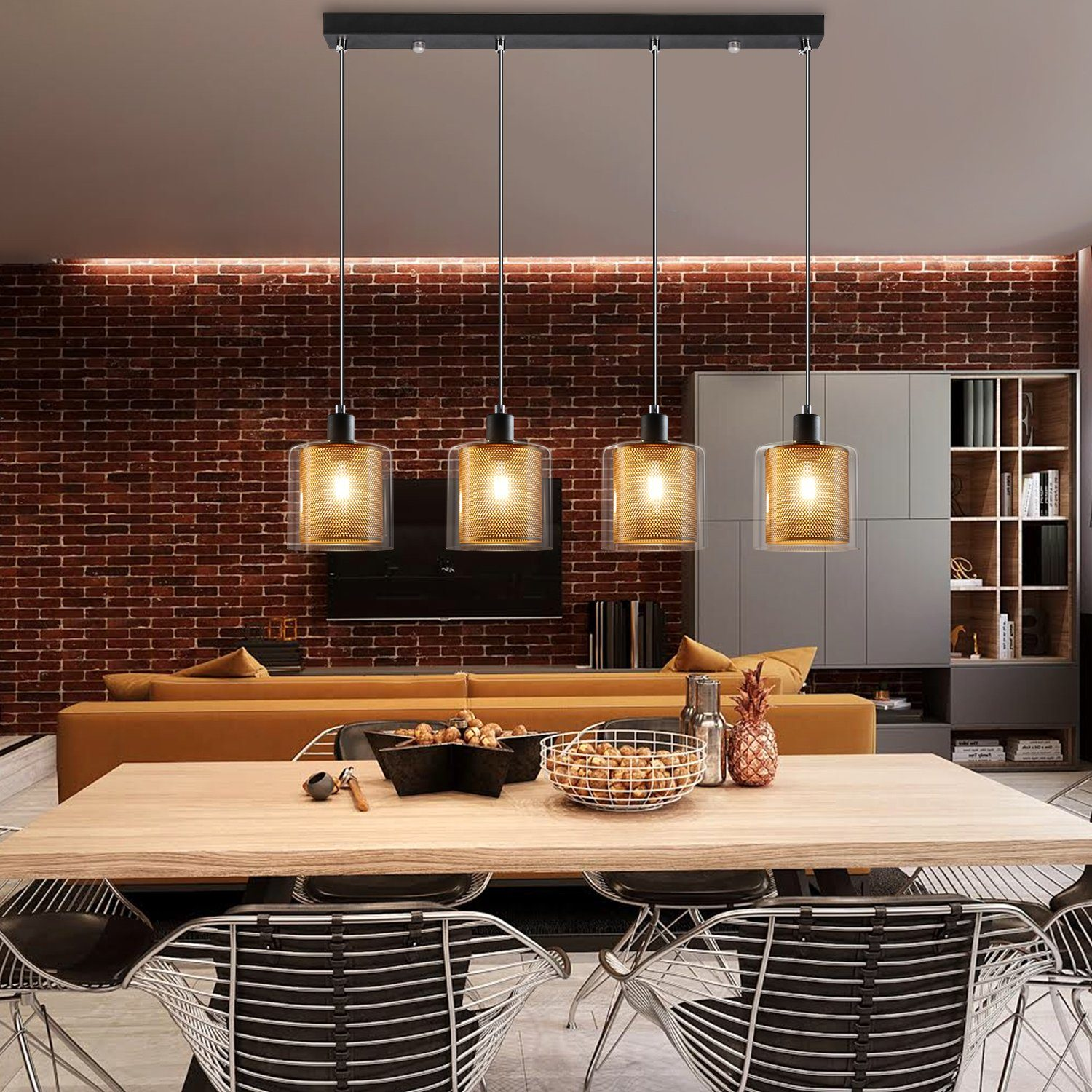 Comedor con mesa de madera, pared de ladrillo y una lámpara moderna con múltiples luces.