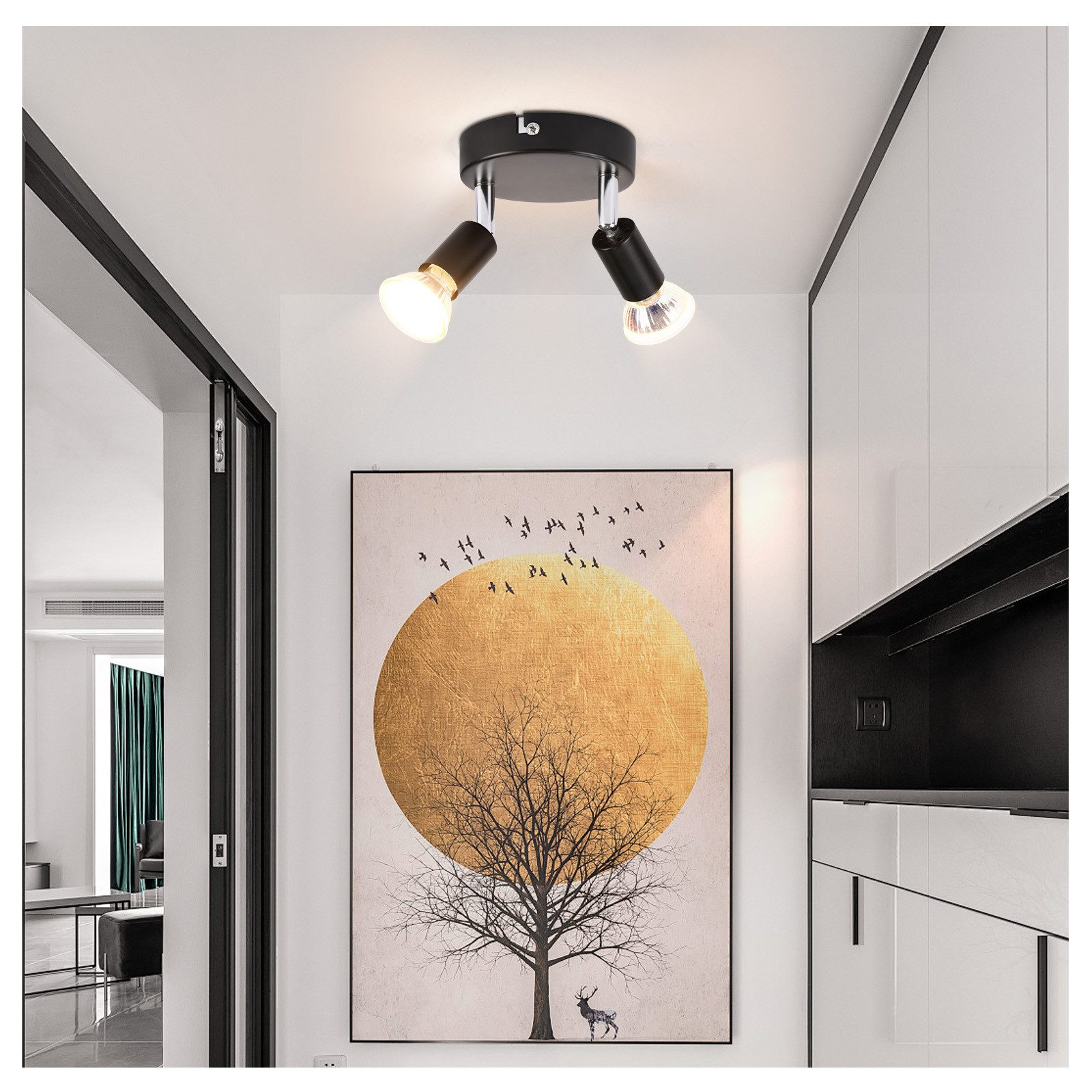 Faretto da soffitto con due luci, apparecchio nero e scena della stanza con arte.