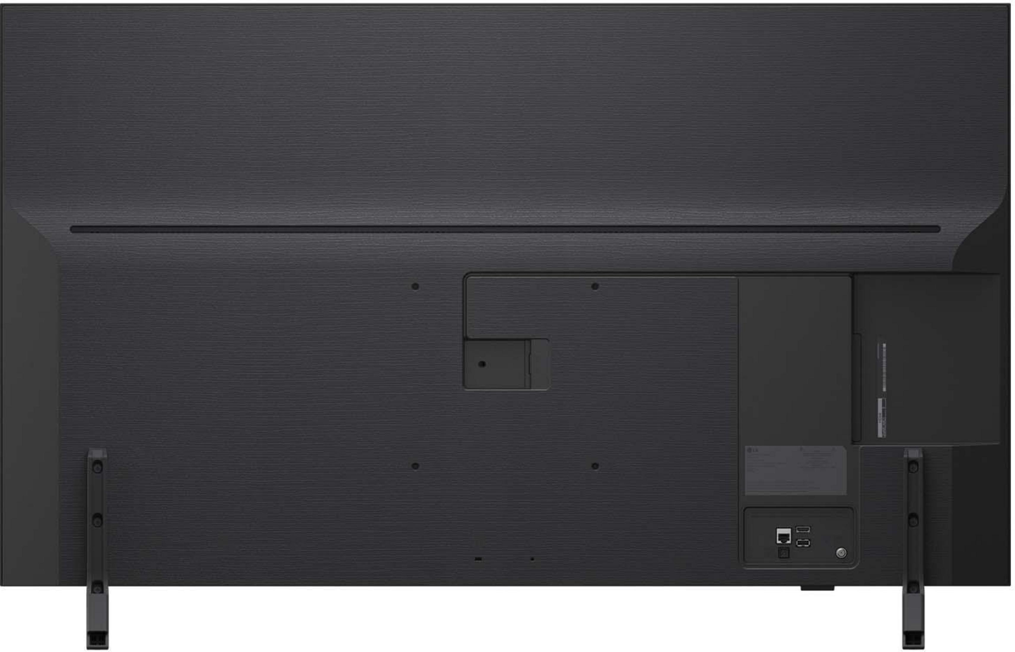 Tył czarnego telewizora LG z portami i podstawkami.