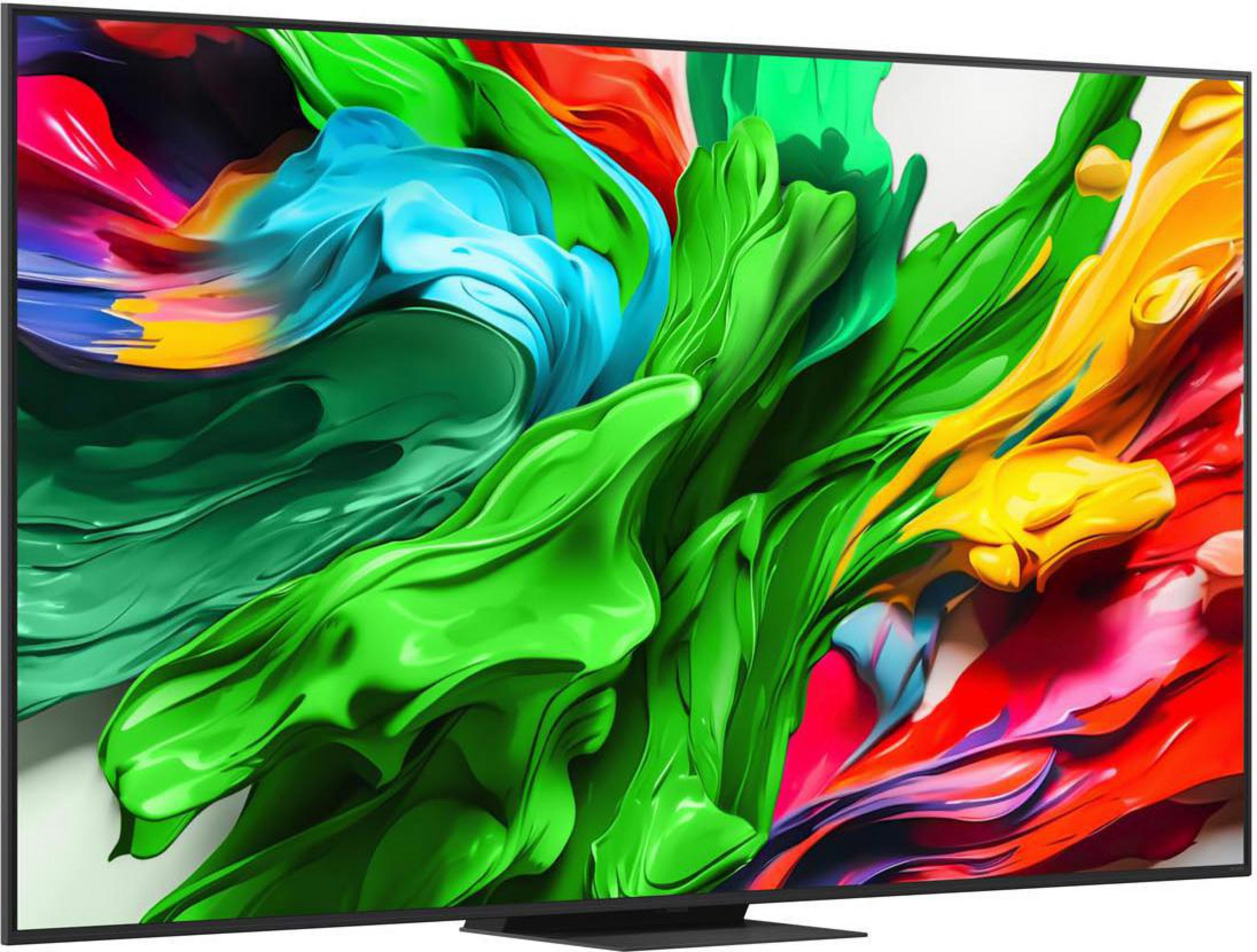 Telewizor wyświetla kolorową sztukę abstrakcyjną. Zielony, niebieski, czerwony i żółty płyną.