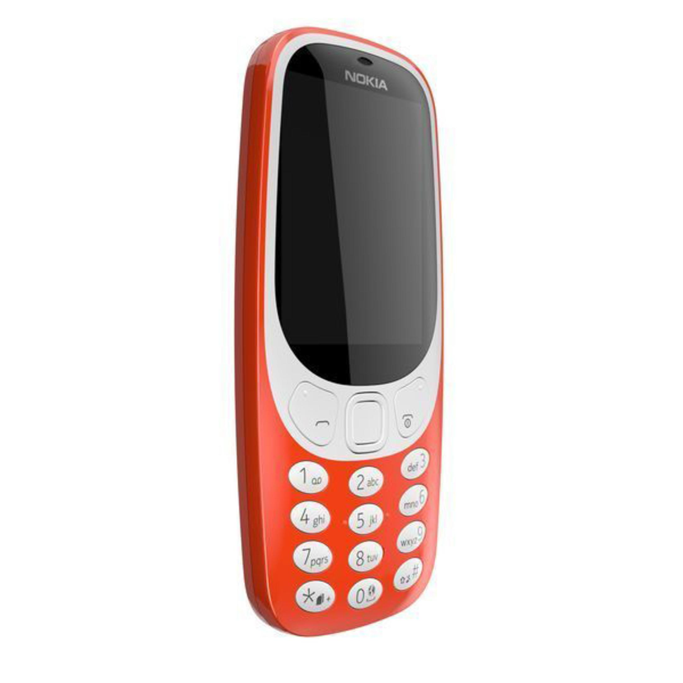 Czerwony telefon komórkowy Nokia 3310.