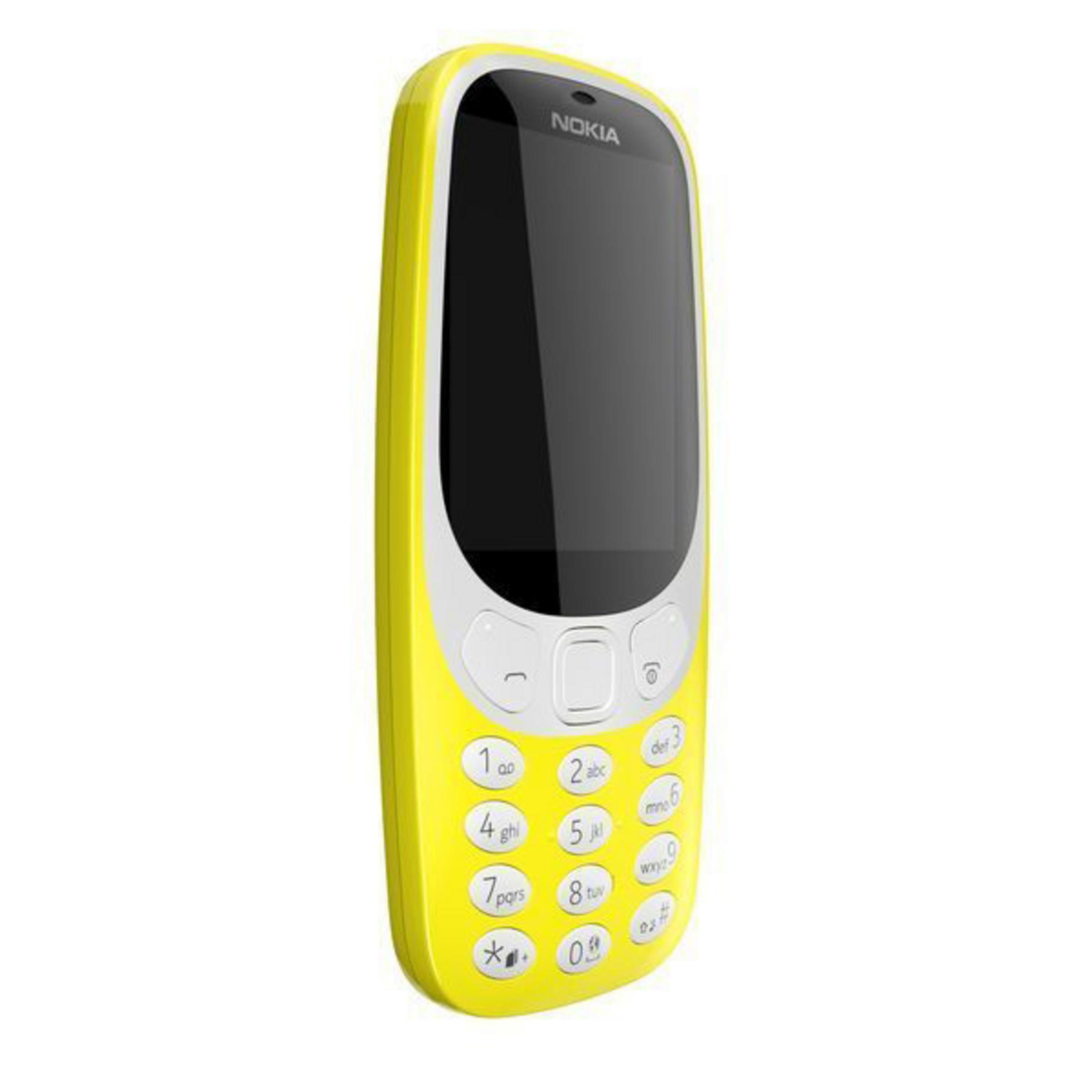 Ein gelbes Nokia-Telefon. Es hat einen schwarzen Bildschirm, mit Zahlentasten und einem Richtungspad.