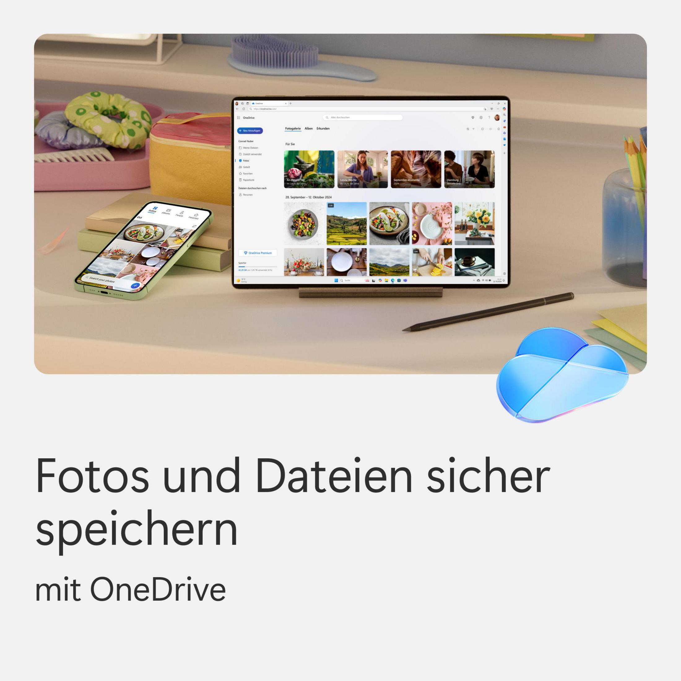 Tablet e telefono con immagini su un tavolo, con testo su OneDrive.