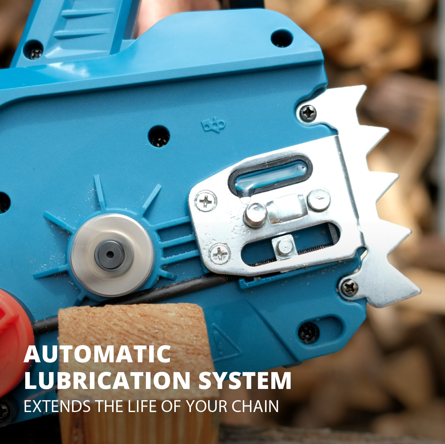 Szczegół piły łańcuchowej. Tekst: Automatyczny system smarowania. Wydłuża żywotność łańcucha. Turkusowo-szara piła łańcuchowa.