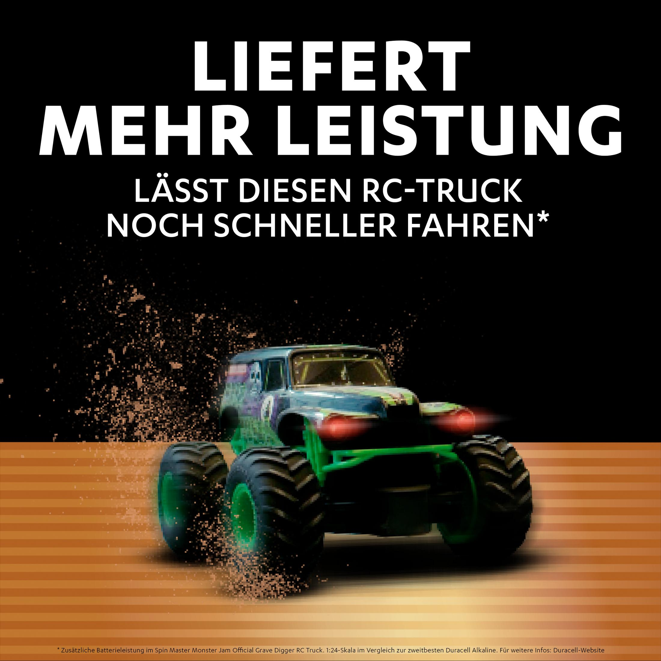 Monster truck na brązowym tle. Tekst: Zapewnia więcej mocy. Lecący brud.