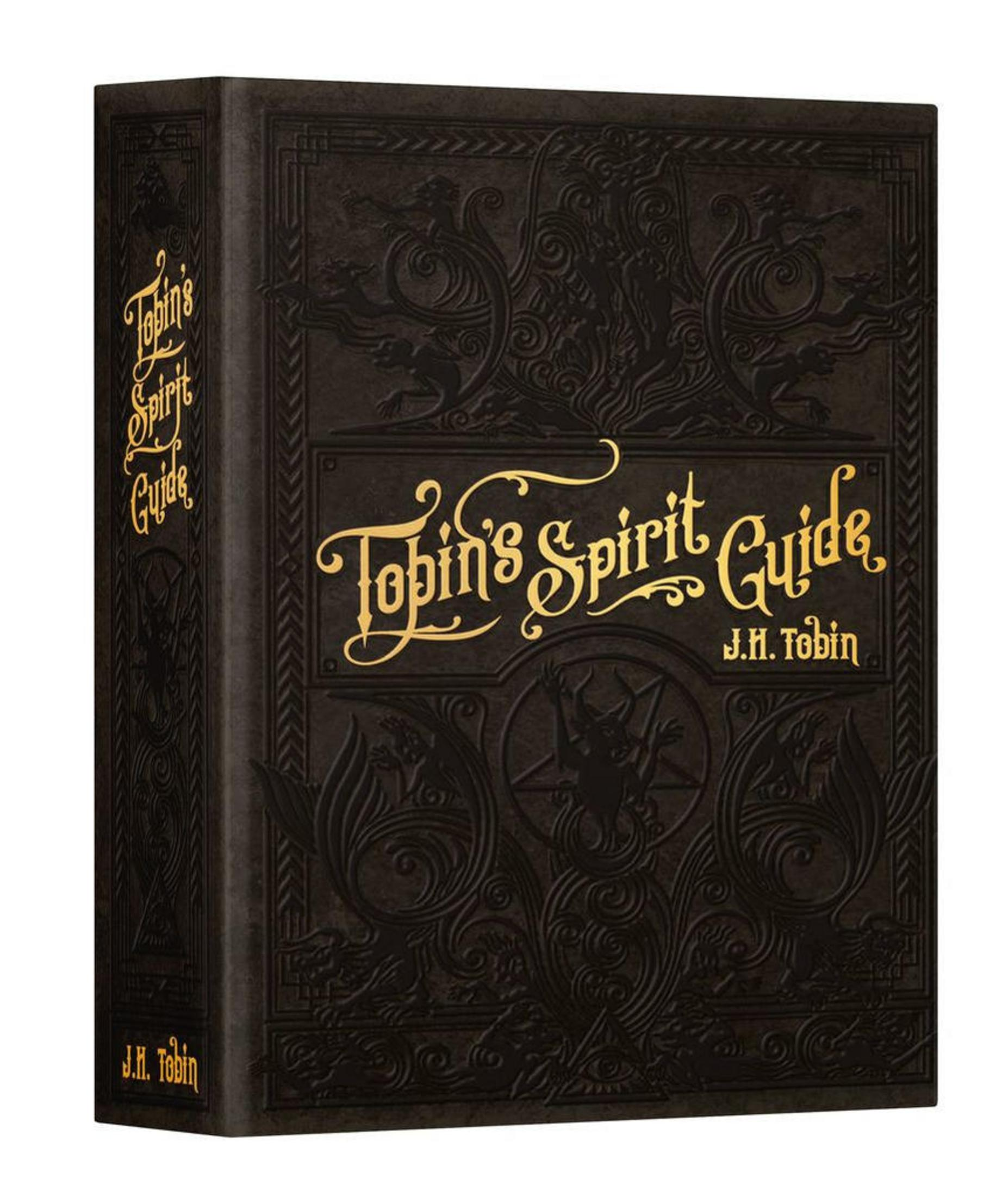 Ein Hardcover-Buch mit dem Titel 'Tobin's Spirit Guide' mit Prägedetails und Goldlettern.
