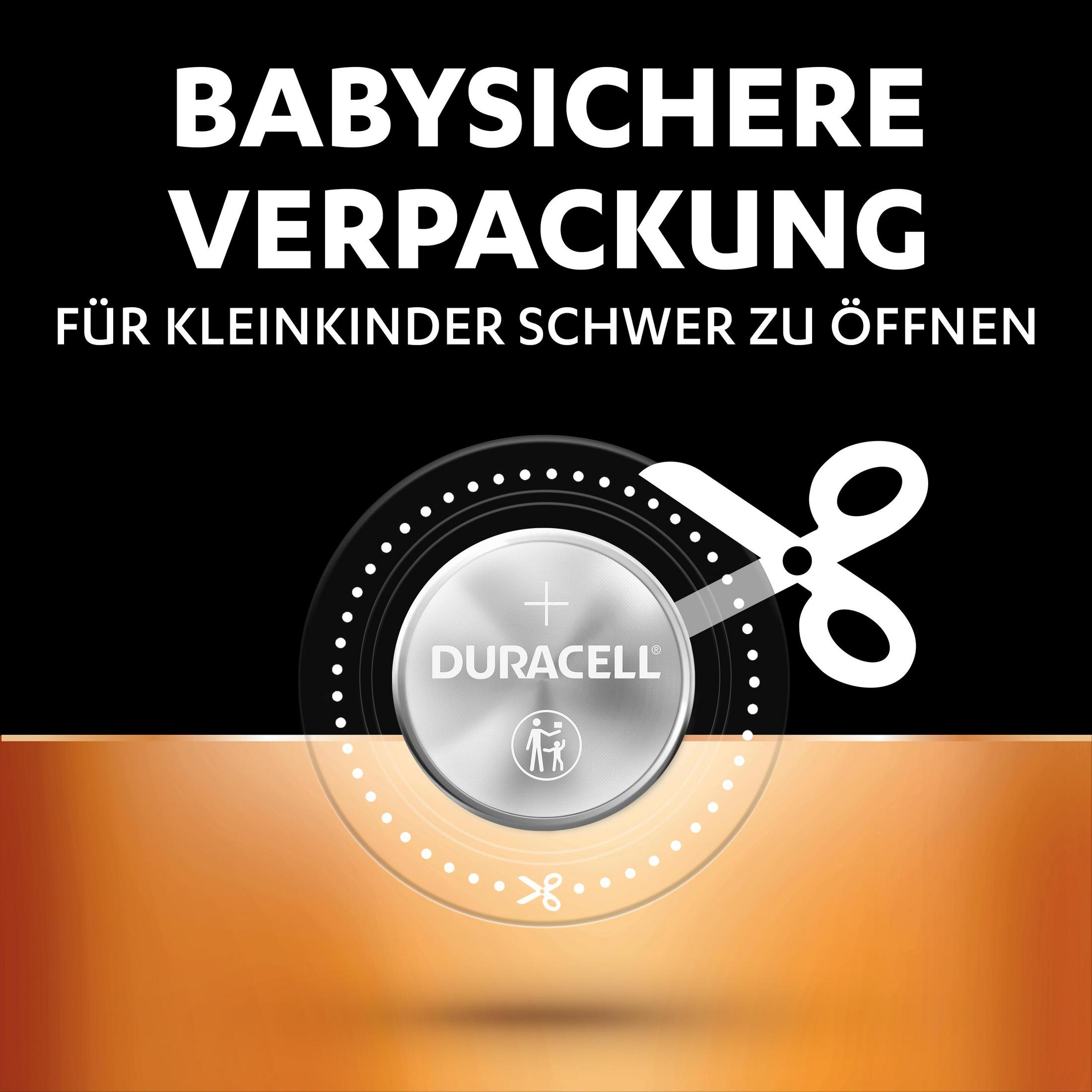 Opakowanie baterii Duracell, zaprojektowane z myślą o bezpieczeństwie dzieci. Ikona nożyczek wskazuje otwarcie.