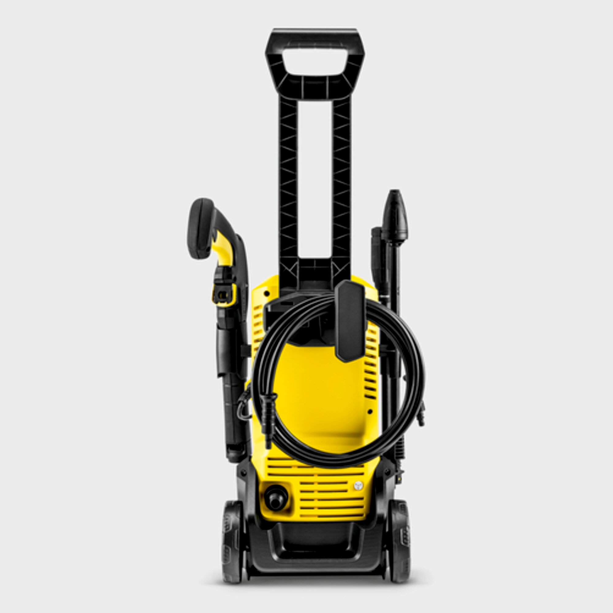 Yellow and black pressure washer with handle, hose, and nozzles. Wheels are at the base.