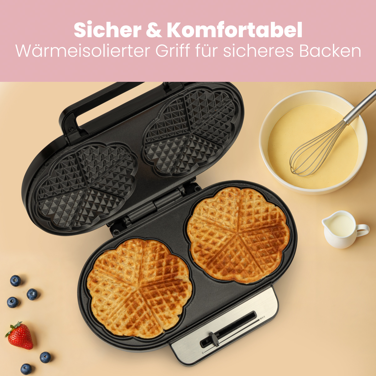 Gofrownica z upieczonymi goframi, składnikami i tekstami.