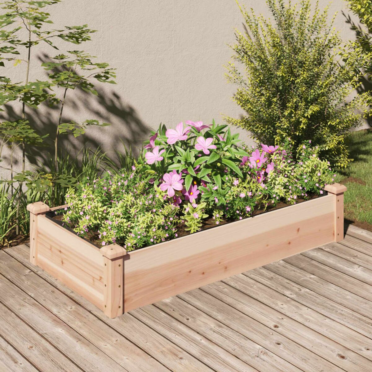 Erhöhtes Gartenbeet aus Holz, gefüllt mit Blumen und Pflanzen, auf einer Holzterrasse.