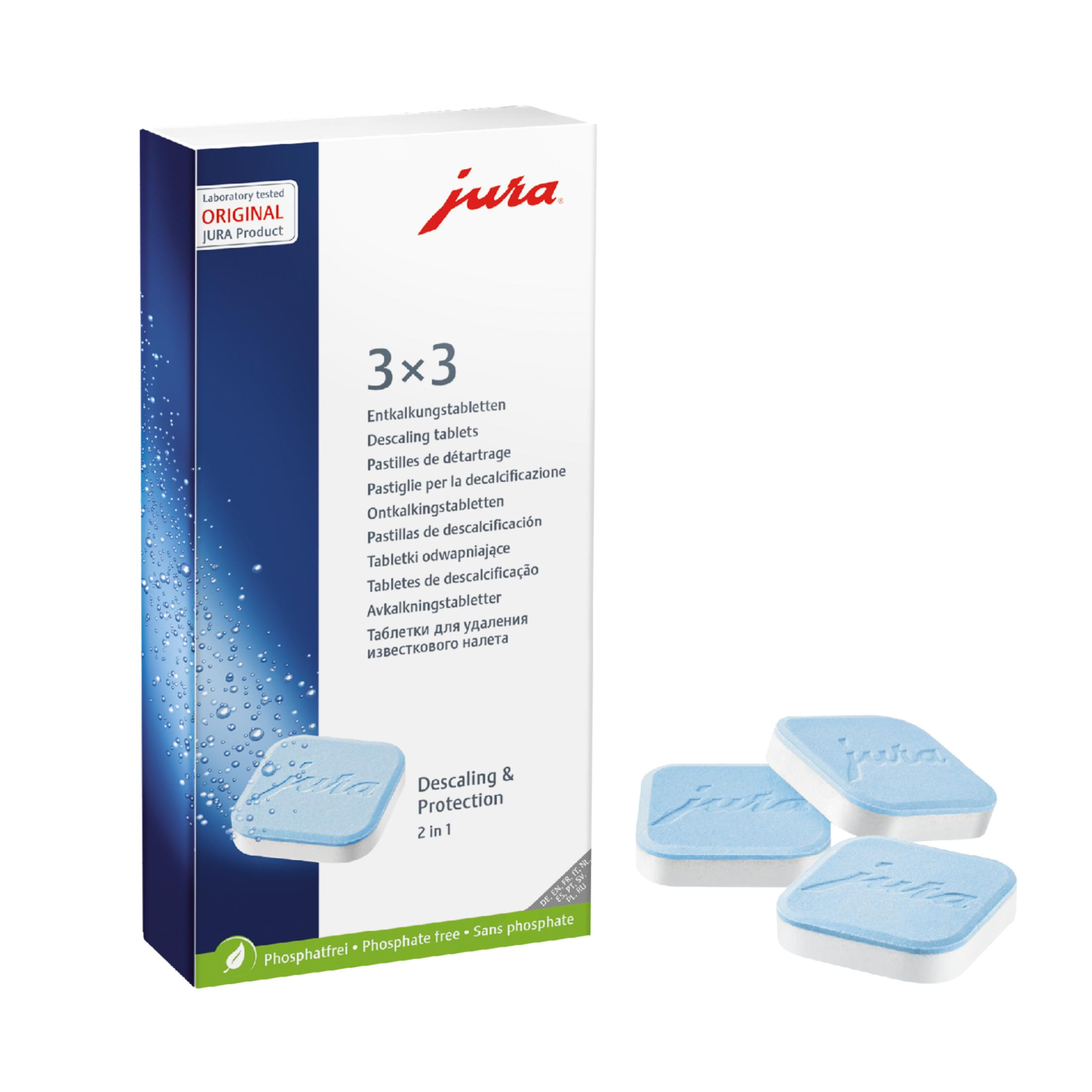 Una scatola di pastiglie anticalcare Jura. Alcune pastiglie sono visibili a destra.