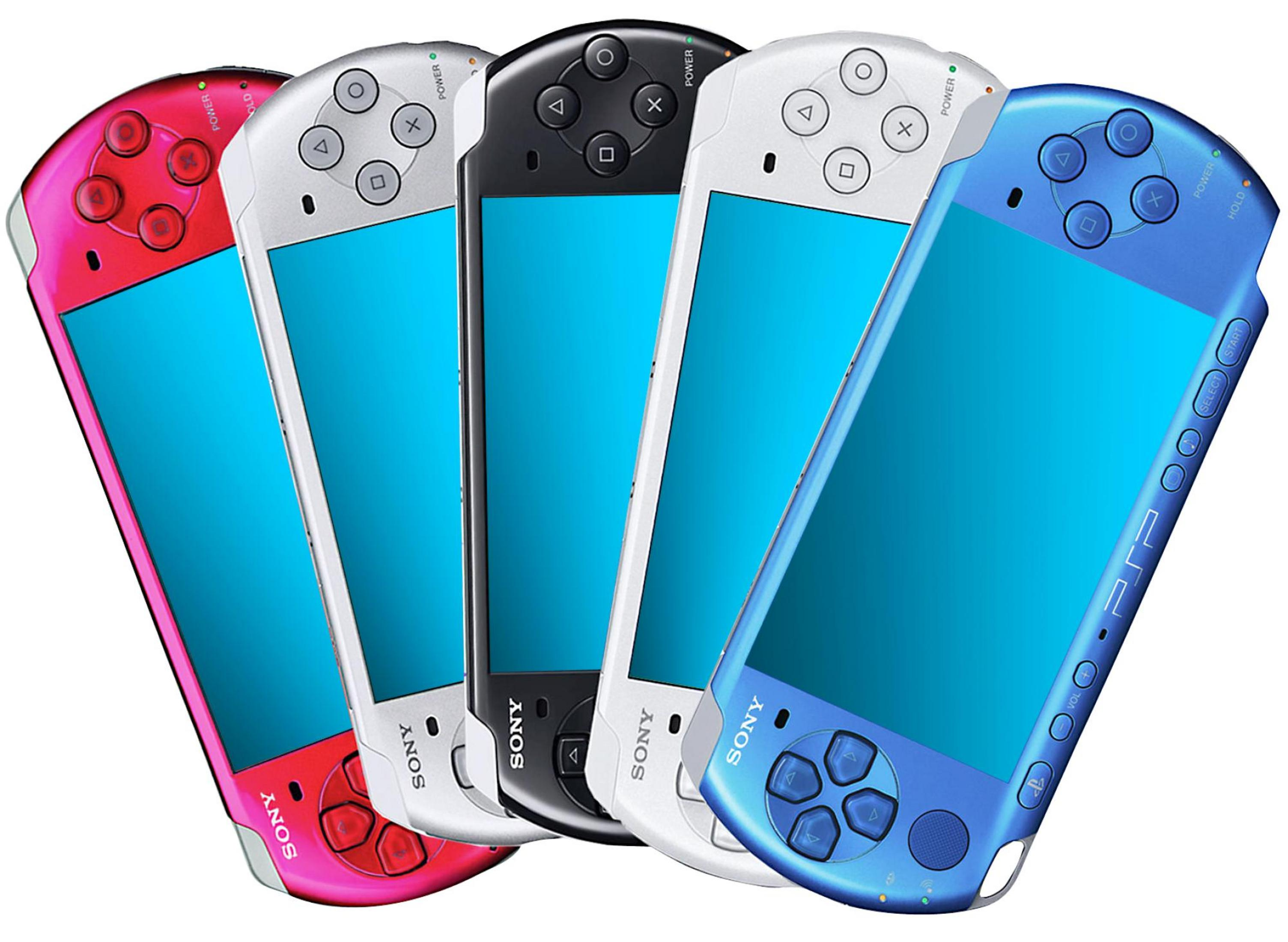 Fünf PSP-Konsolen in verschiedenen Farben: rot, silber, schwarz, weiß und blau, mit blauen Bildschirmen.