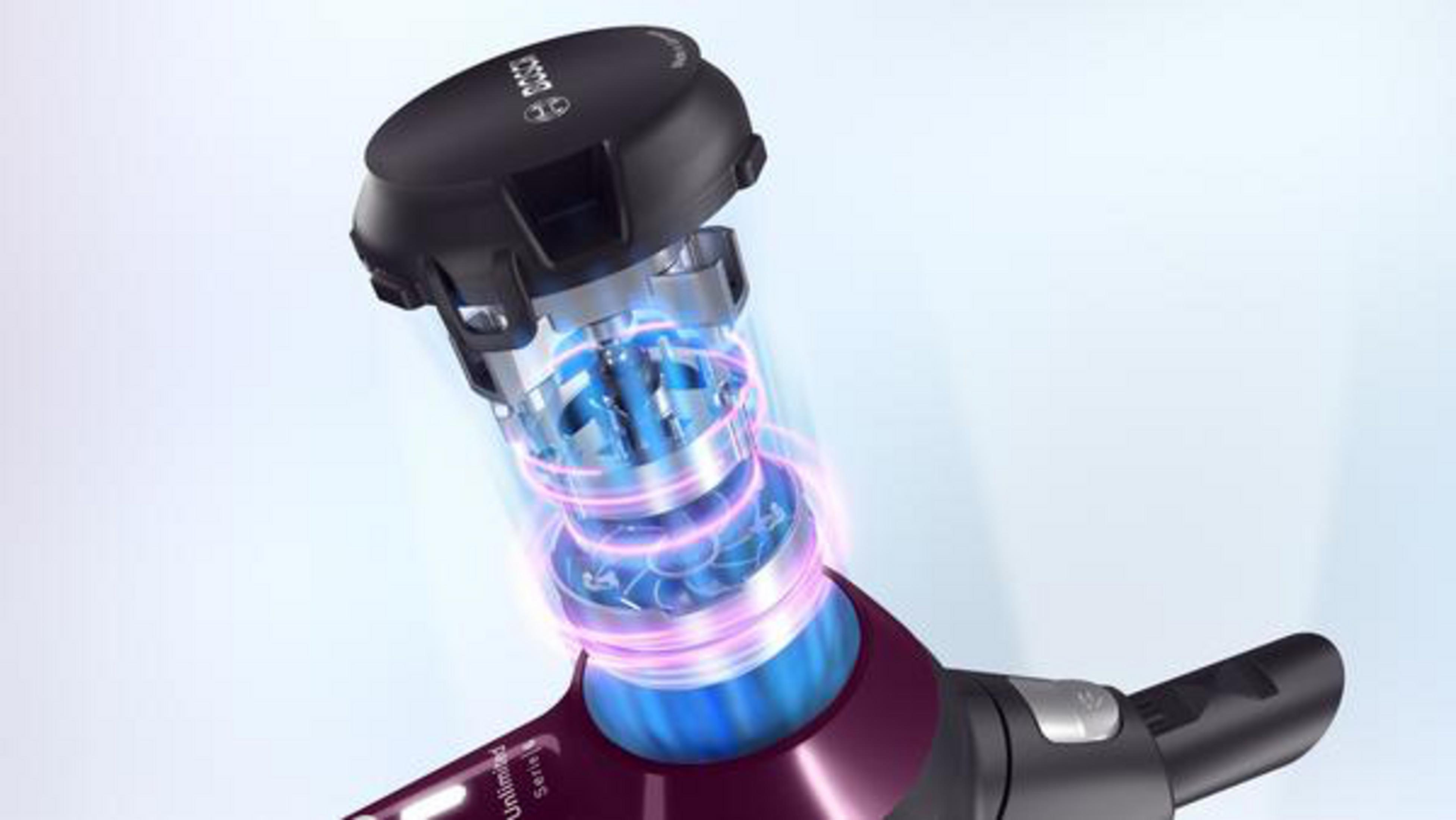 Primo piano del motore dell'aspirapolvere con effetti di luce blu e viola.