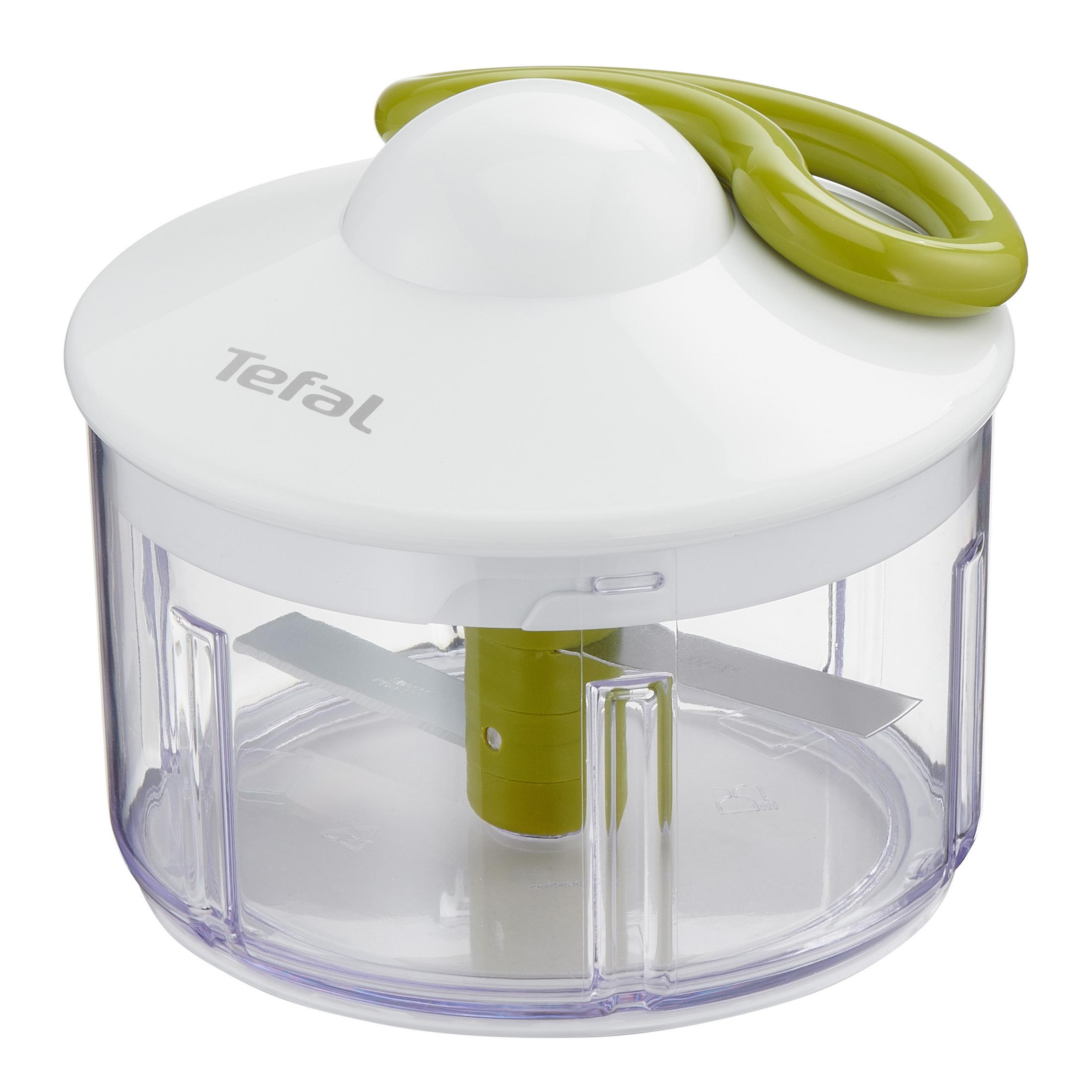Un tritatutto manuale bianco e verde con un contenitore trasparente e lame.