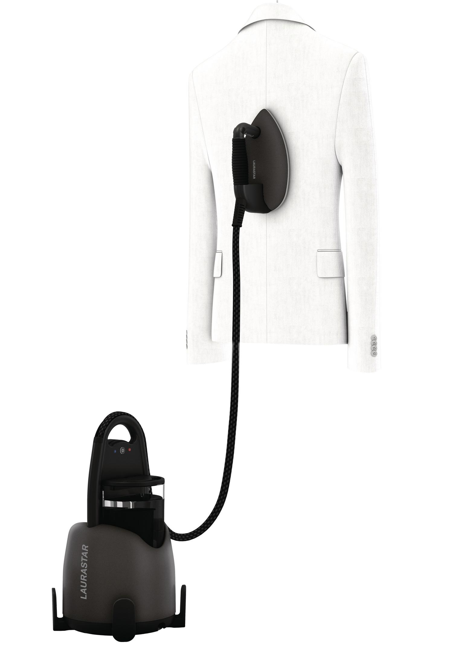 Laurastar steam generator iron ironing a white jacket, black iron.