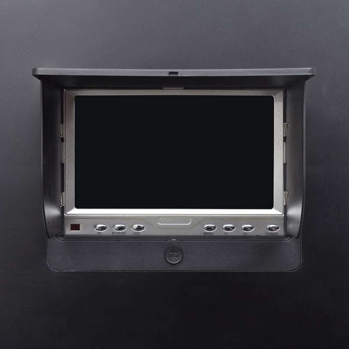 Nahaufnahme eines schwarzen LCD-Bildschirms mit Knöpfen. Der Bildschirm ist in einem schwarzen Gehäuse.