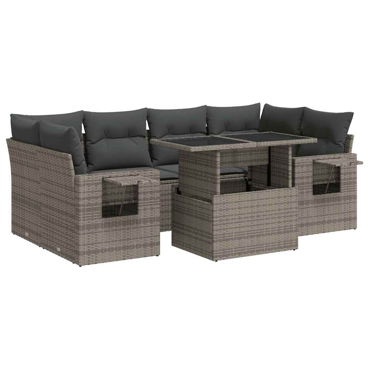 Divano angolare in rattan grigio con cuscini e un tavolo.