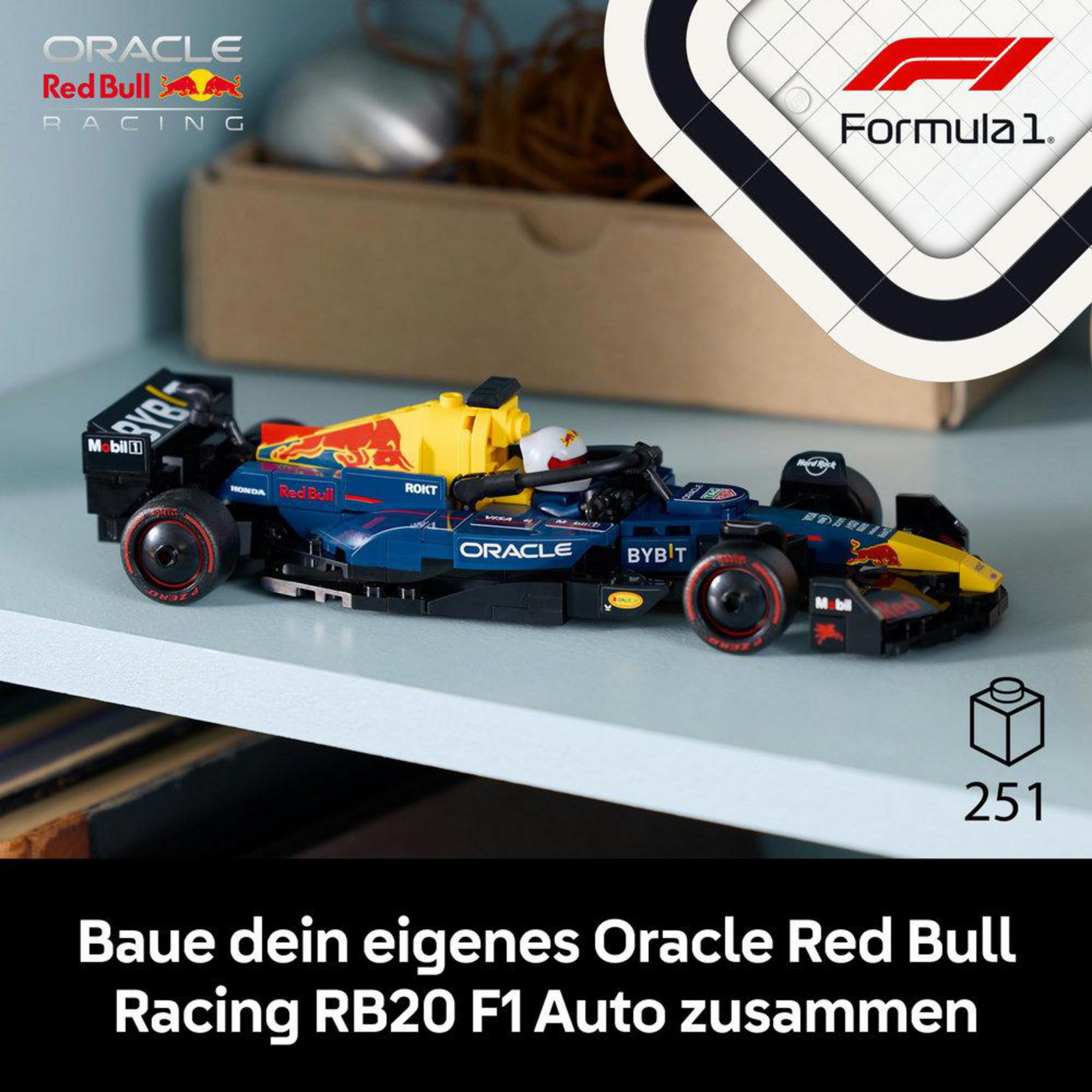 Model samochodu wyścigowego Red Bull wykonany z klocków LEGO, z logo F1 i pudełkiem.