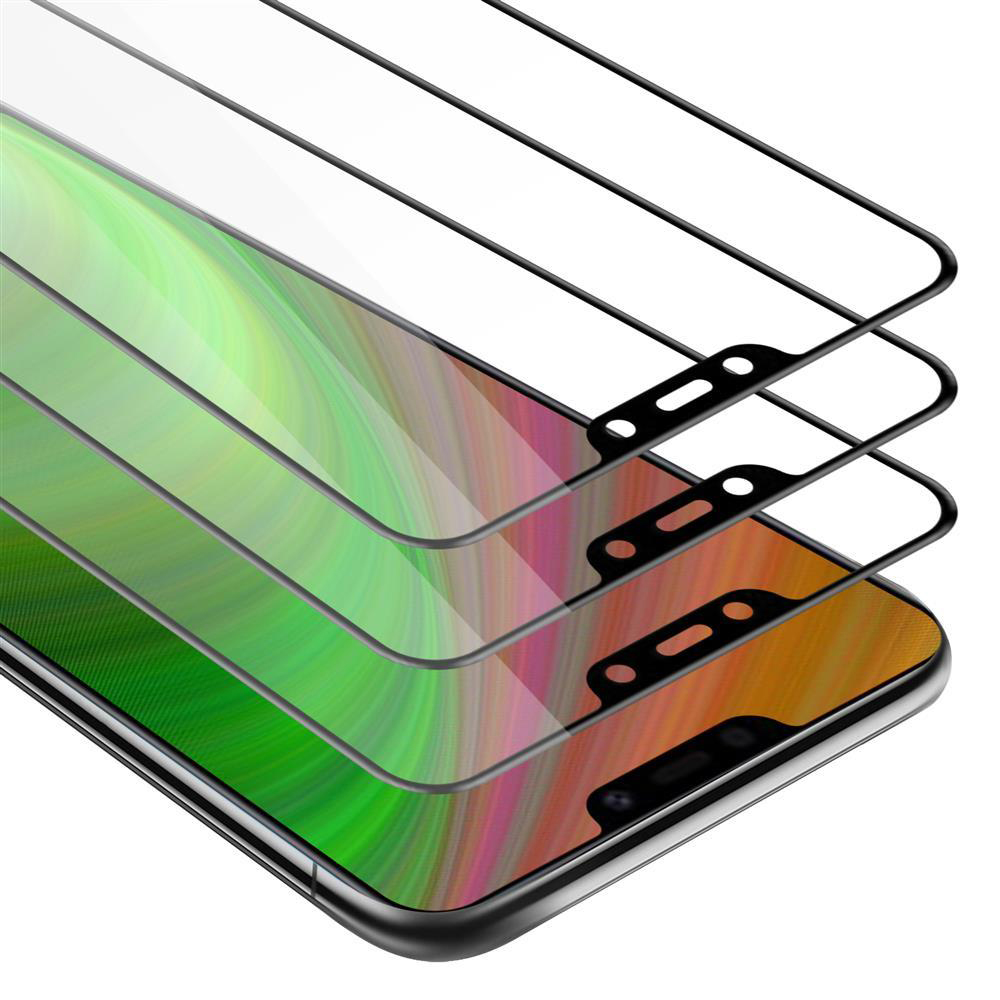 Primo piano di tre proteggi schermo per telefono, impilati con più strati.