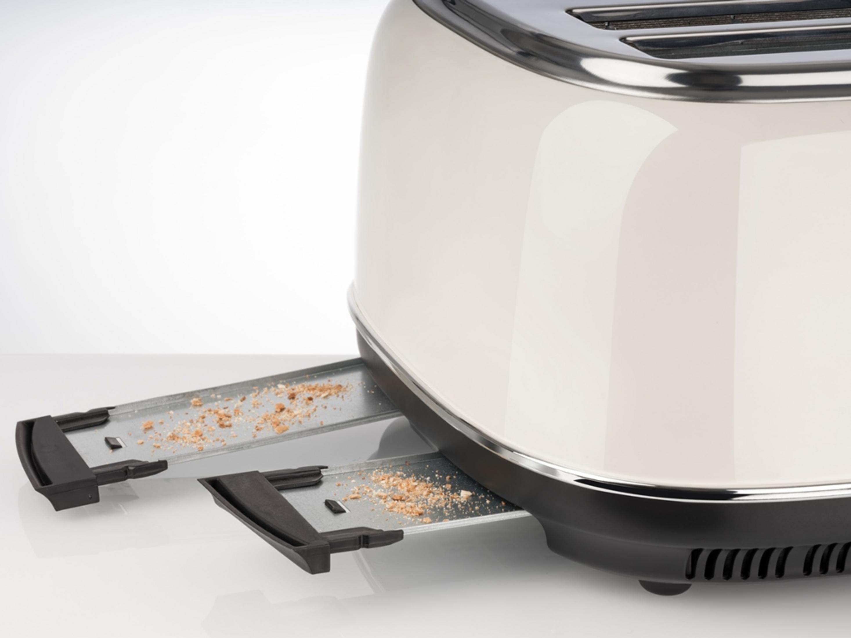 Toster z okruchami w tackach, kolor kremowy.