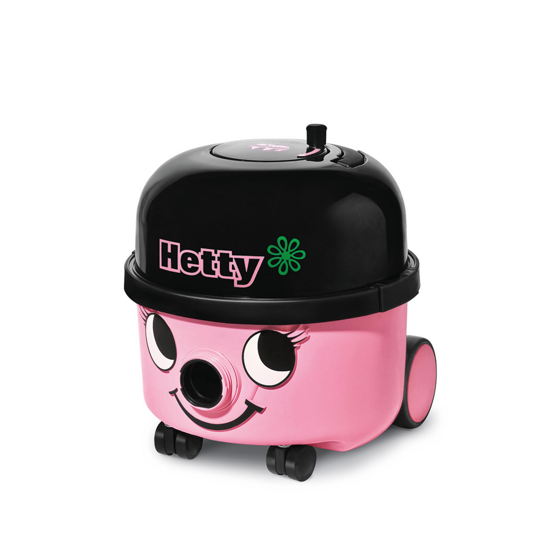 Różowy i czarny odkurzacz z uśmiechniętą twarzą. Białe tło.