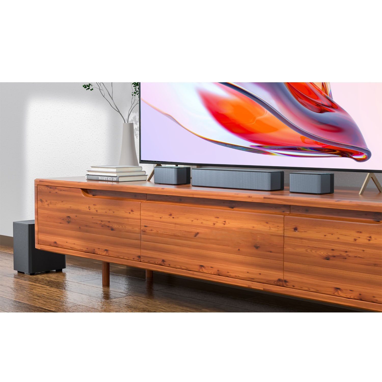 Salon z telewizorem, drewnianą szafką, systemem dźwiękowym i subwooferem.