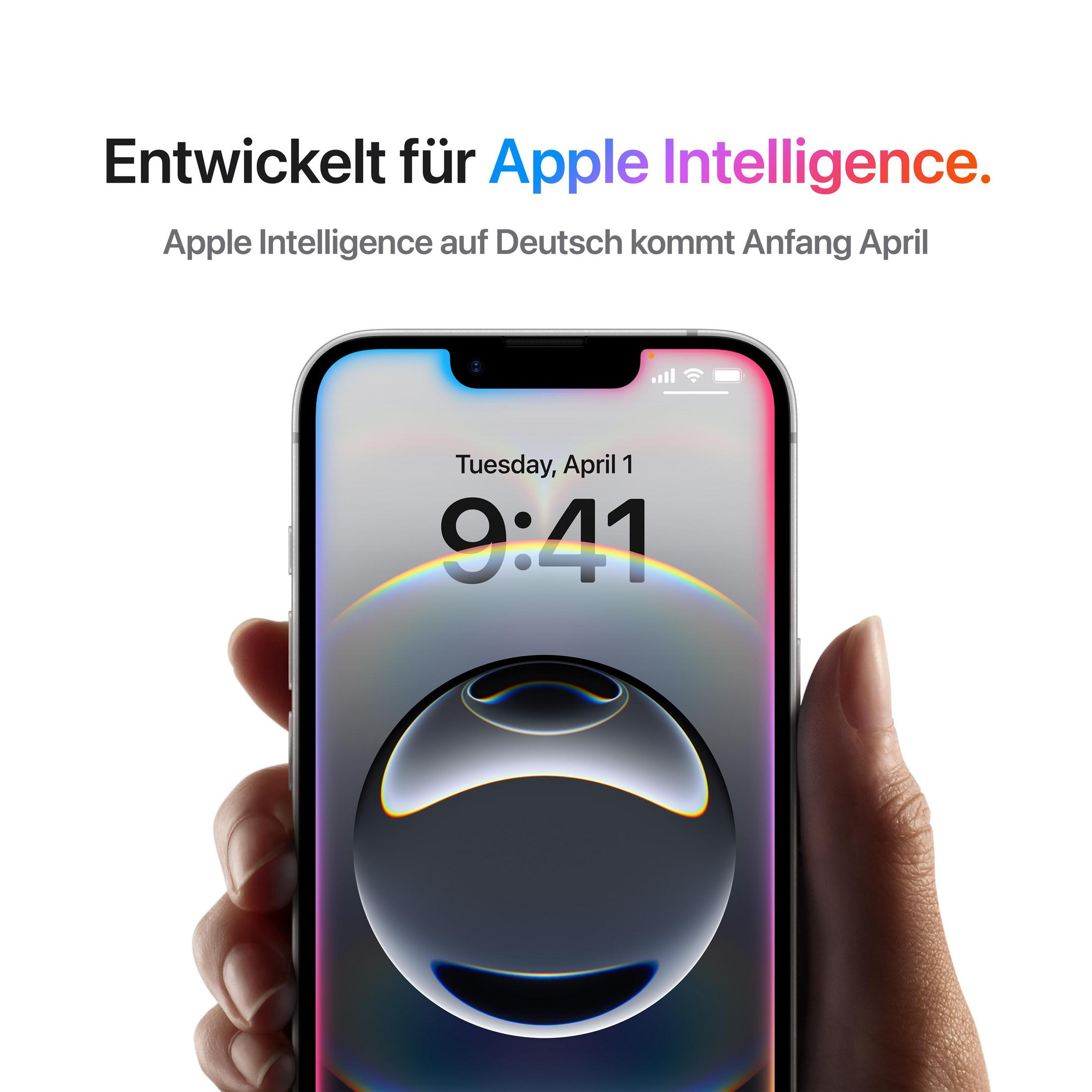 Ręka trzyma telefon z ekranem pokazującym kolorowy obraz i tekst o Apple Intelligence.