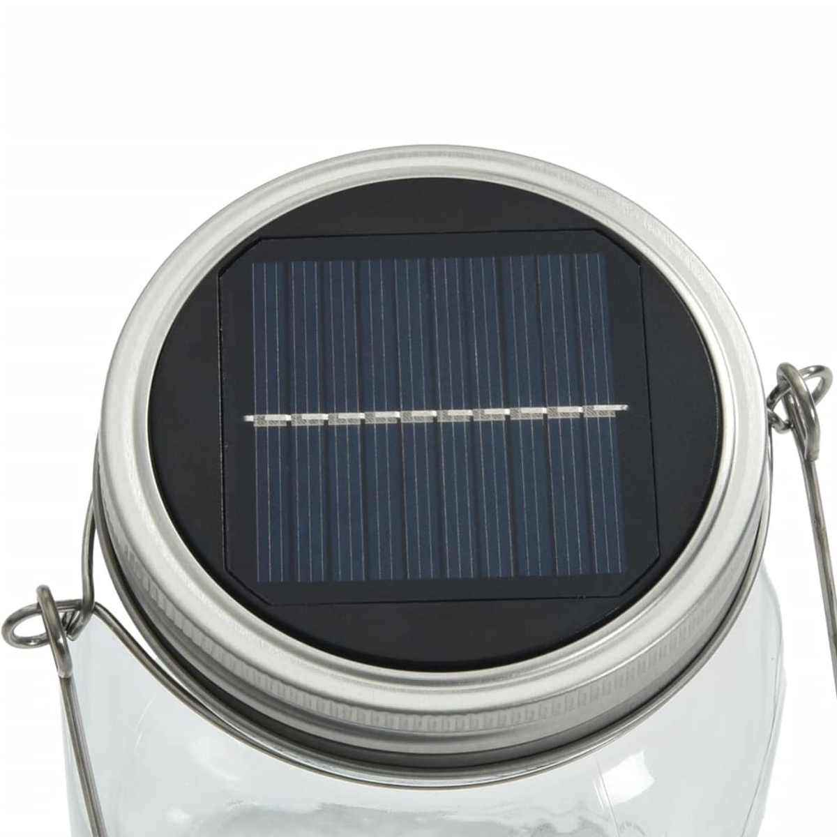 Primo piano di un pannello solare su un coperchio di barattolo. Il pannello è nero, con un bordo argentato.