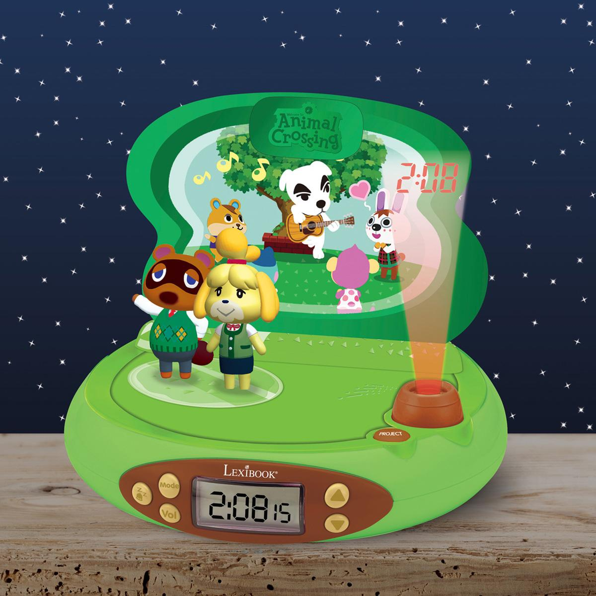Sveglia verde Lexibook Animal Crossing che proietta stelle, con personaggi del gioco su una superficie di legno.