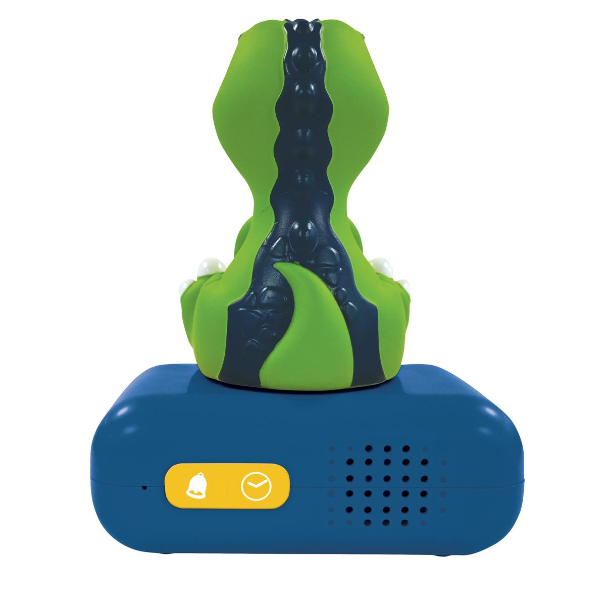 Primer plano de un despertador de dinosaurio verde. El reloj es azul con botón de campana amarilla y pantalla.