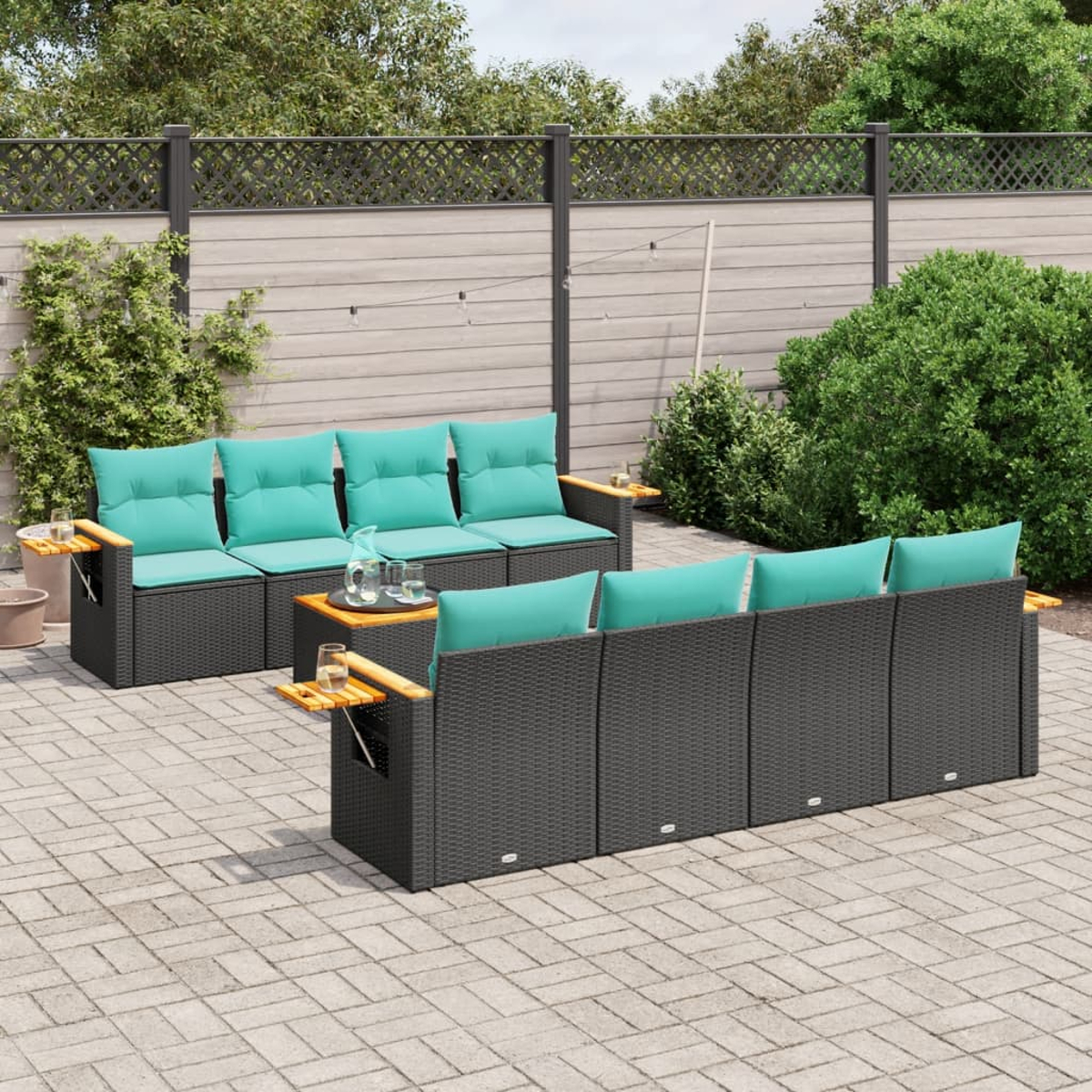 Set di mobili per patio esterno, vimini nero con cuscini turchese, tavolo con bevande.
