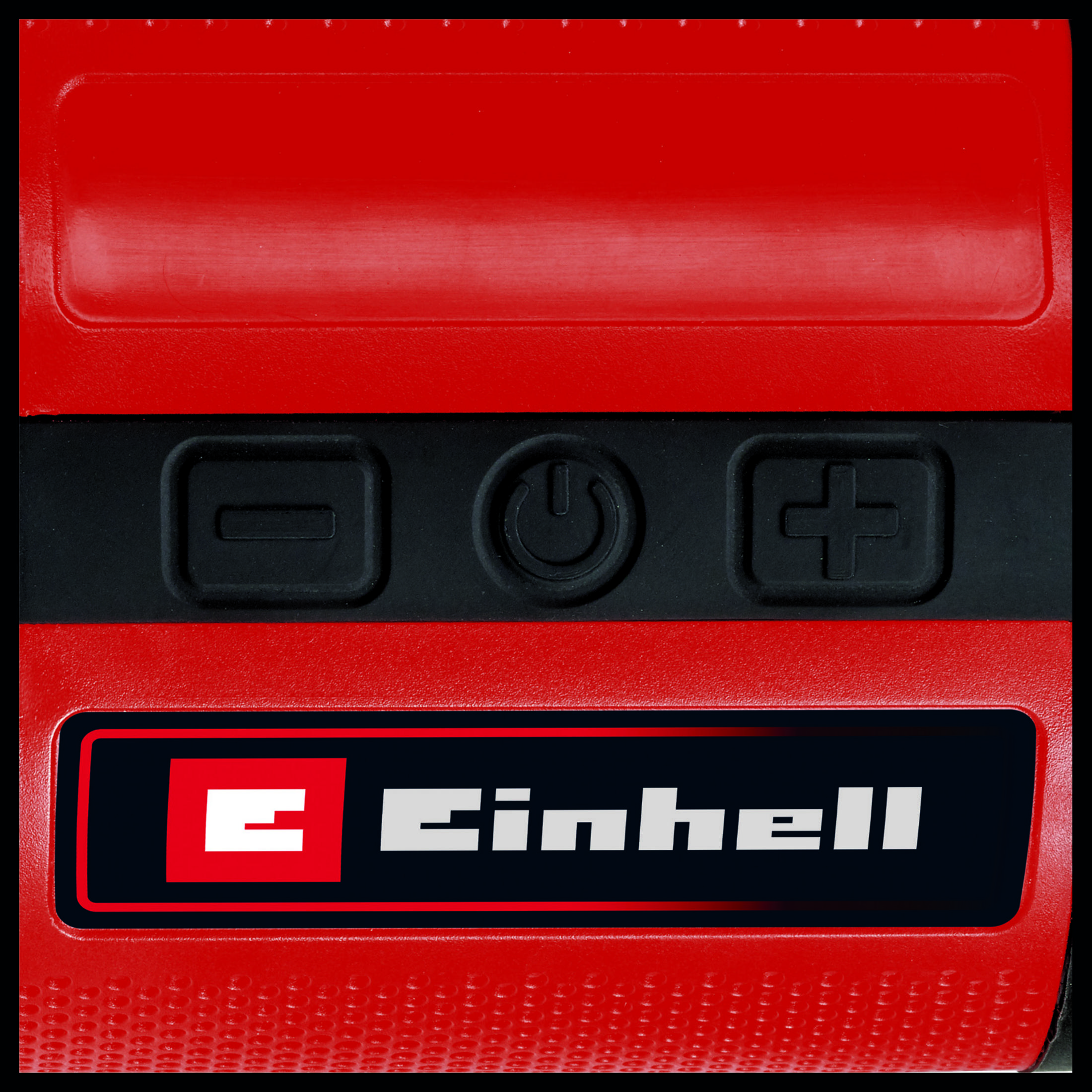 Un dispositivo rosso con pulsanti, il logo Einhell e dettagli neri. Ha un pulsante di accensione nero.
