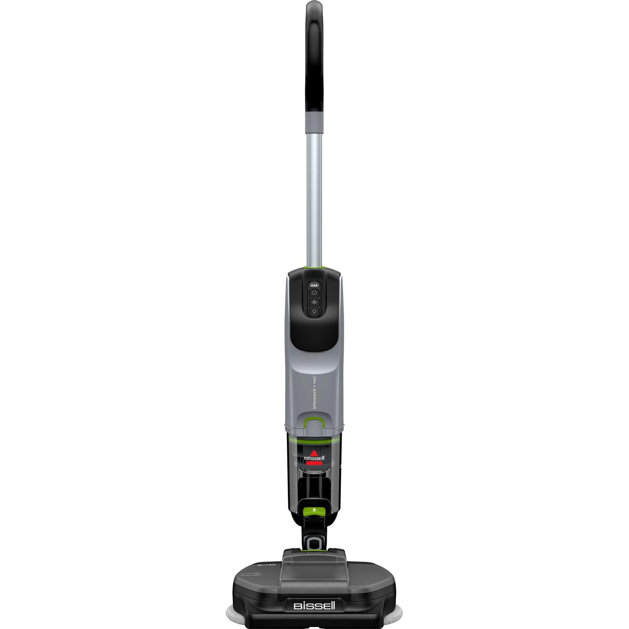 Una limpiadora Bissell SpinWave blanca y gris de pie. Tiene un mango largo.
