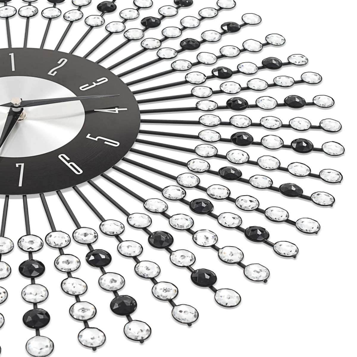 Schwarze und silberne Uhr mit Kristallakzenten, die in einem radialen Muster angeordnet sind.