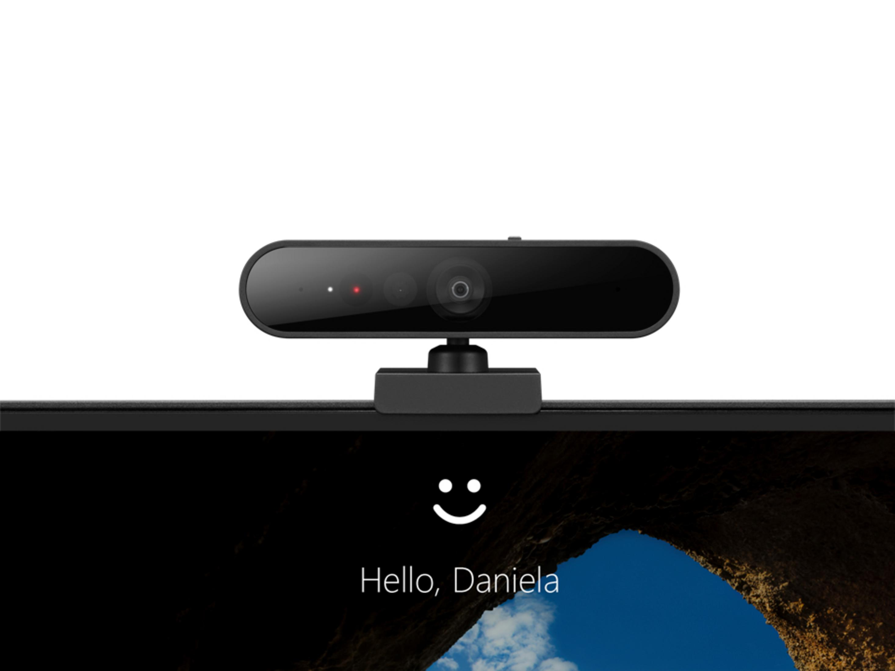 Webcam op een scherm met "Hallo, Daniela" en een smiley.