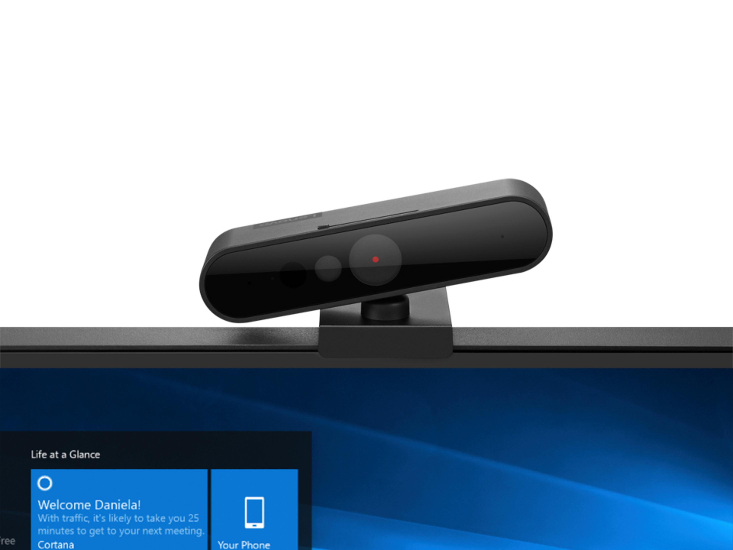 Webcam op een monitor, met een melding en een scherm.