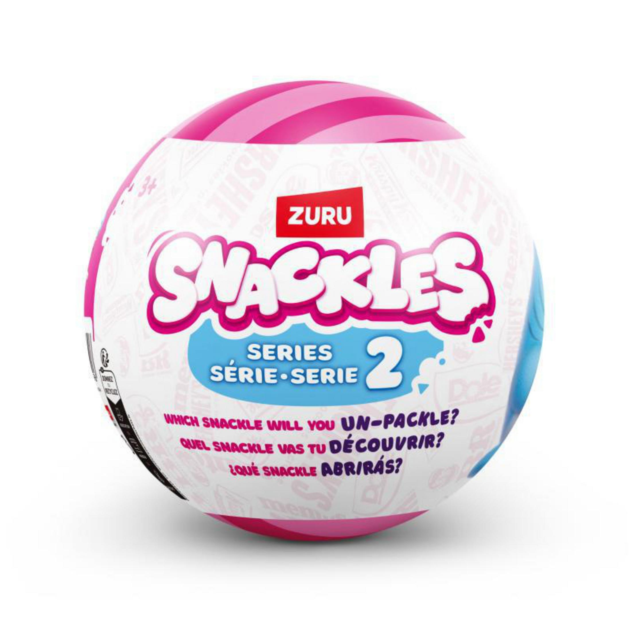 Snackles Serie 2 Ball mit rosa und weißem Design, Text: 'SNACKLES'.