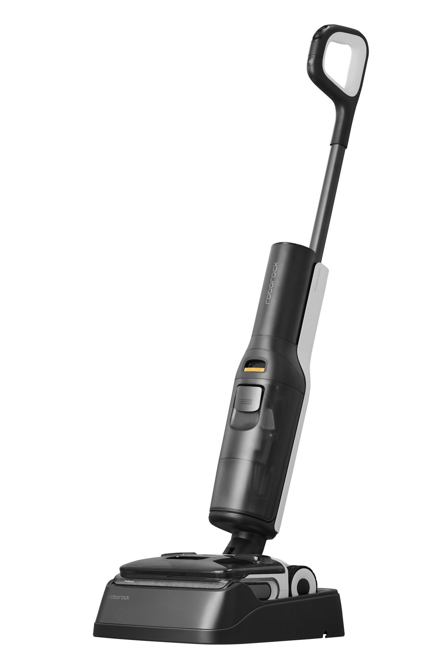 Un aspirateur sans fil noir et blanc avec une longue poignée, sur fond blanc.
